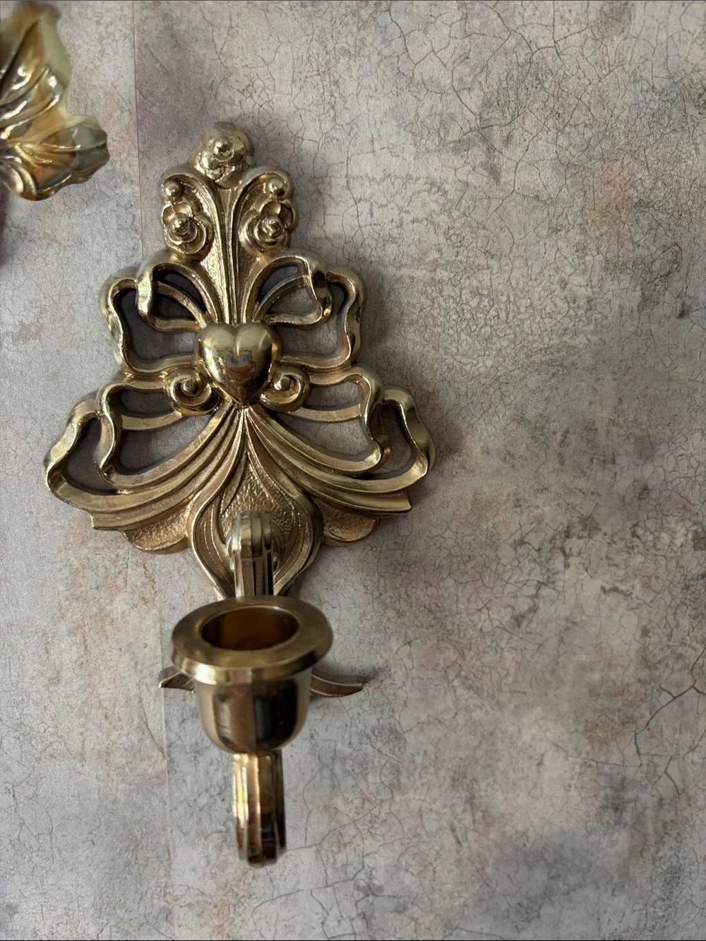 Gold Ornate Oval Wall Mirror with Decorative Leaf Accents